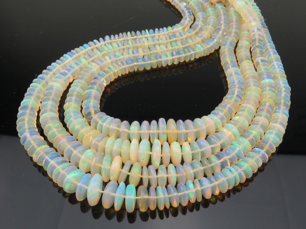 AA Ethiopian Opal Smooth Disc Beads 4-9mm ~ 16'' Strand