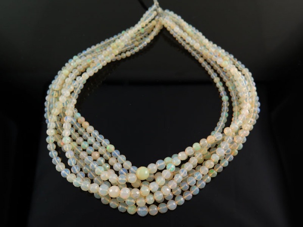 AA Ethiopian Opal Micro-Faceted Round Beads 4-7mm ~ 15'' Strand