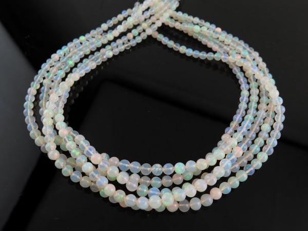 AA Ethiopian Opal Smooth Round Beads 4-6mm ~ 17'' Strand