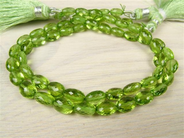 AA+ Peridot Micro-Faceted Oval Beads 6-7.5mm ~ 8'' Strand