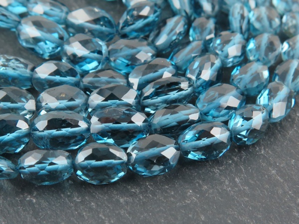 AA+ London Blue Topaz Faceted Oval Beads 6-9mm ~ 15'' Strand