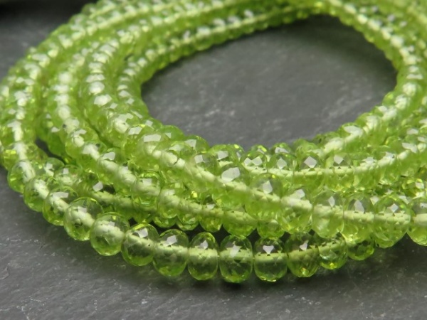 AA+ Peridot Micro-Faceted Rondelles 3.25-4.75mm ~ 8'' Strand