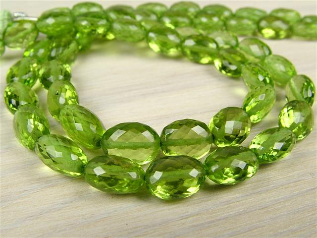 AA+ Peridot Micro-Faceted Oval Beads 6-7.5mm ~ 8'' Strand